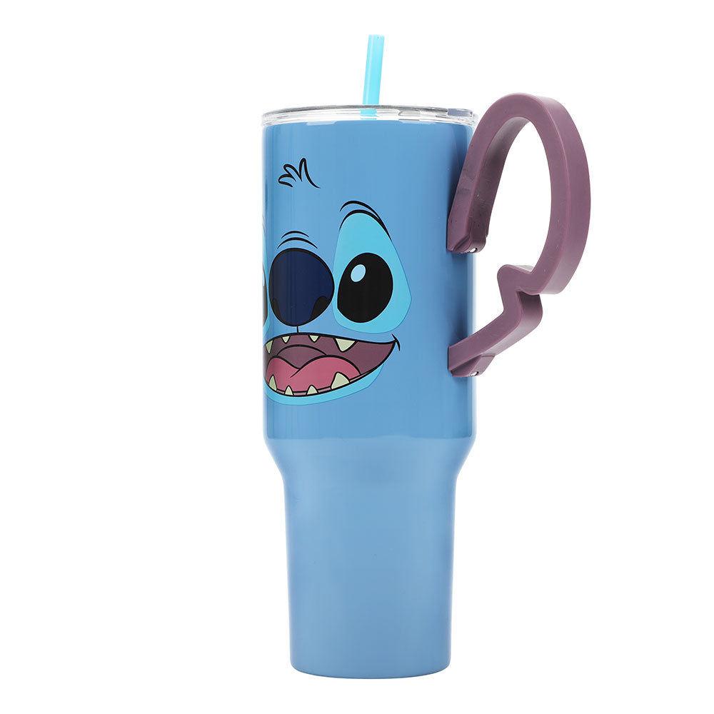 Blue tumbler with Stitch cartoon character face and purple handle on a white background